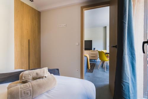 Postel nebo postele na pokoji v ubytování Apartamentos Mikka Clos