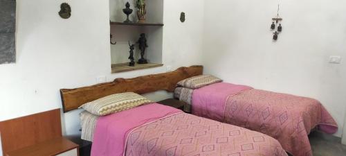 Кровать или кровати в номере Agriturismo Gli Aranci dell'Etna