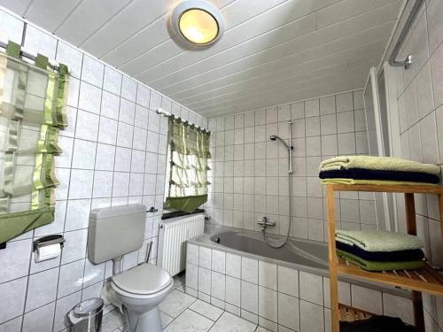 Ванная комната в Romantische Ferienwohnung Marie - Historisches Flair und Infrarot-Sauna