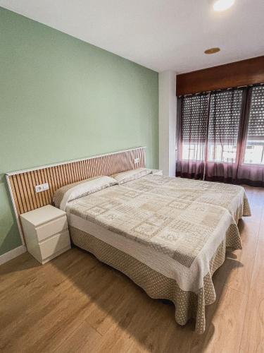 Postel nebo postele na pokoji v ubytování Hostal La Frontera