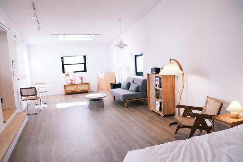 Un ou plusieurs lits dans un hébergement de l'établissement 薄荷巴黎 Coffee House