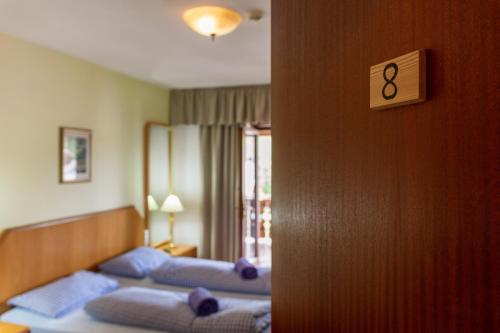 Ένα ή περισσότερα κρεβάτια σε δωμάτιο στο Appartements Pension Sonia