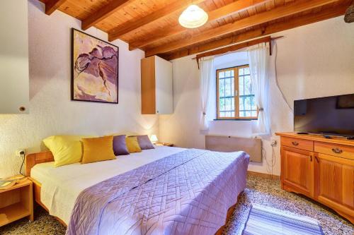 Postel nebo postele na pokoji v ubytování Casa Aromatica Maria