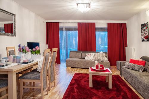 Posezení v ubytování Apartamenty Czerwone Maki Wisła