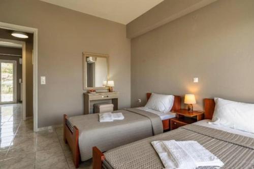 Postel nebo postele na pokoji v ubytování Grand view resort