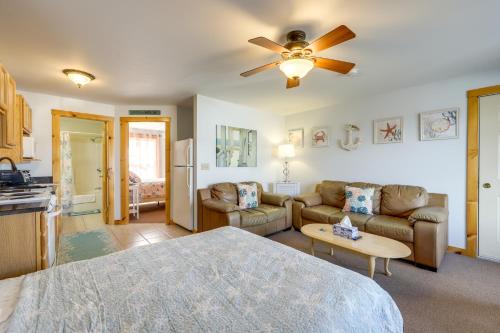 a bedroom with a bed and a living room at Wells Vacation Rental about 1 Mi to Beach Access! in Wells