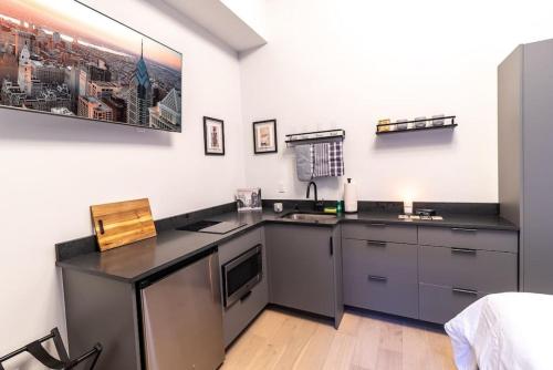 Kuchyň nebo kuchyňský kout v ubytování Thena Hotel - Cozy Studio
