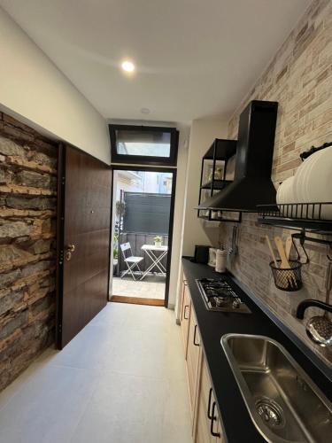 Kuchyň nebo kuchyňský kout v ubytování Home Catania Dante Accommodations