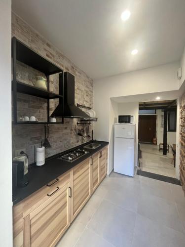 Kuchnia lub aneks kuchenny w obiekcie Home Catania Dante Accommodations
