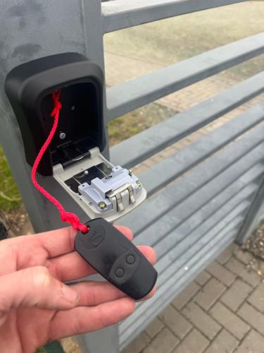 a person holding a cell phone in a card booth at Palava eu 8 in Pavlov