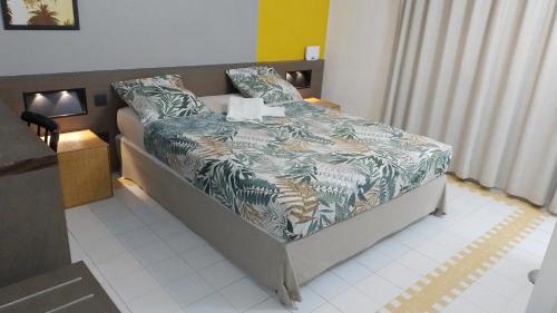 Posteľ alebo postele v izbe v ubytovaní Karibbean Sweet Home