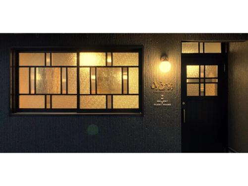 a room with a door and a window at Ukishimakan Bettei Guest House - Vacation STAY 14350 in Shimo-rokka