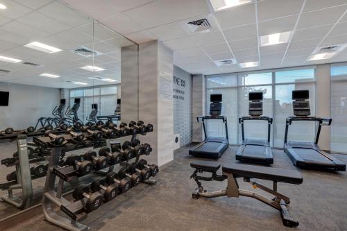 a gym with treadmills and elliptical machines at Fairfield by Marriott Inn & Suites Minneapolis Downtown in Minneapolis