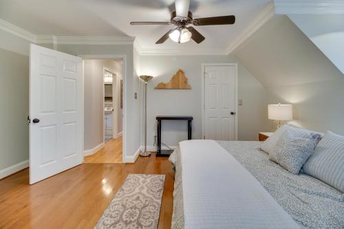 a bedroom with a bed and a ceiling fan at Cozy Virginia Vacation Rental with Seasonal Pool! in Nokesville