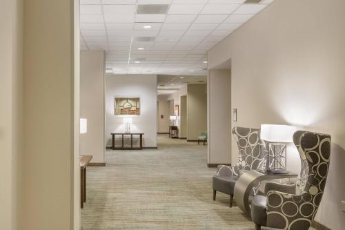 a hallway of a hospital with chairs and a waiting room at Residence Inn Portland Downtown/RiverPlace in Portland