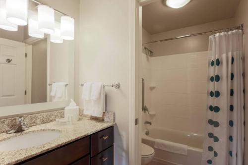 a bathroom with a sink and a toilet and a shower at TownePlace Suites El Centro in El Centro