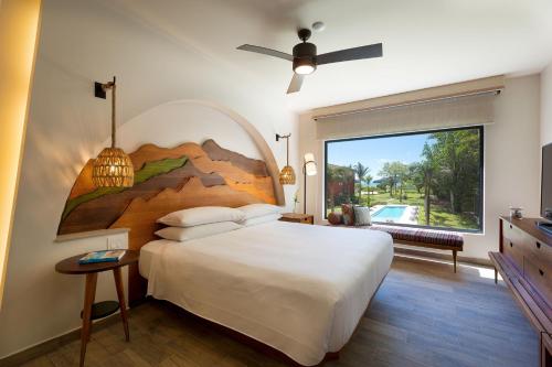 A bed or beds in a room at Marriott Vacation Club at Los Sueños