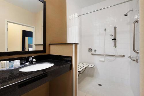 a bathroom with a sink and a shower at Fairfield Inn Kankakee Bourbonnais in Bourbonnais