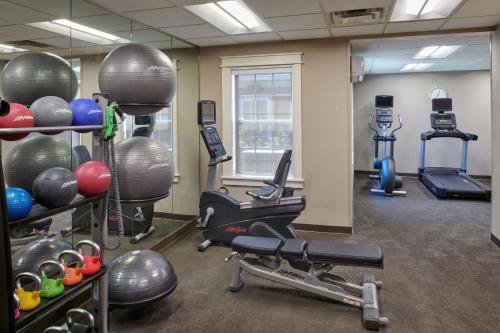 a fitness room with a gym with exercise equipment at Residence Inn by Marriott Detroit / Novi in Novi
