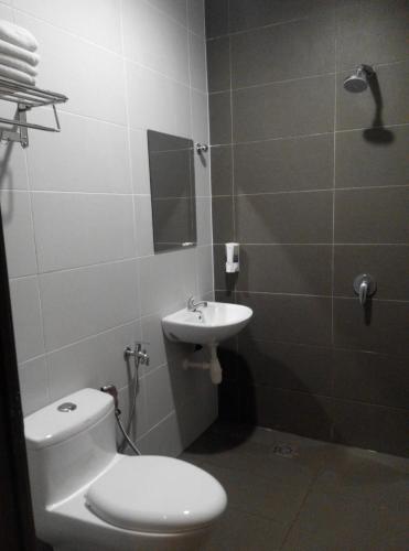 Koupelna v ubytování Welcome Inn GM
