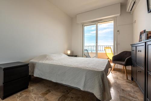Posteľ alebo postele v izbe v ubytovaní Ajaccio, Sanguinaires, Hélios, vue mer magnifique, T2 4pers