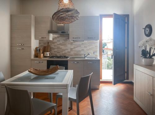 Kuchyň nebo kuchyňský kout v ubytování CityLoft Olbia