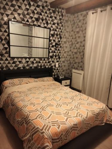 En eller flere senger på et rom på Corneguerre Grand Brassac