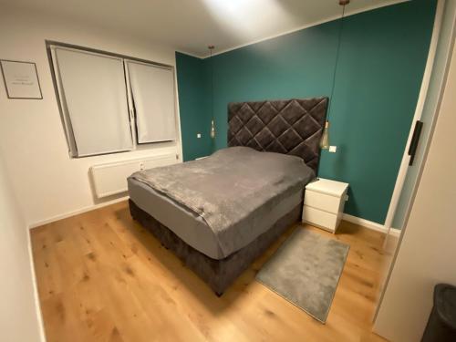 Ένα ή περισσότερα κρεβάτια σε δωμάτιο στο 2 Zimmer Wohnung in Krefeld City/Apartment + Netflix+Prime