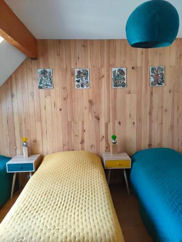 Ένα ή περισσότερα κρεβάτια σε δωμάτιο στο Appartement Duplex dans Résidence VAL DE ROLAND