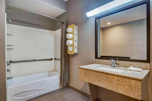 a bathroom with a sink and a mirror at Motel 6-Mesquite, TX - Balch Springs in Balch Springs