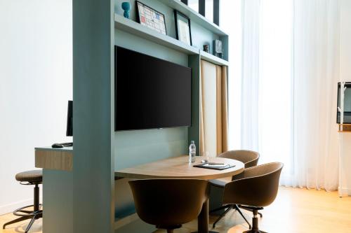 TV o dispositivi per l'intrattenimento presso Courtyard by Marriott Paris Creteil