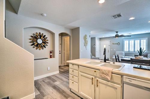 a kitchen with a sink and a counter at Stylish House with Patio, 8 Mi to Vegas Strip! in Las Vegas