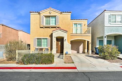 a brick house with a red curb at Stylish House with Patio, 8 Mi to Vegas Strip! in Las Vegas