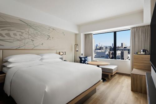Katil atau katil-katil dalam bilik di Courtyard by Marriott Nagoya