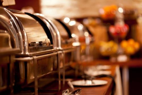 a row of pots and pans on a kitchen counter at Niagara Falls Marriott Fallsview Hotel & Spa in Niagara Falls