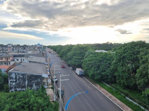 a view of a city street with a road at Portobello Hotel Orla in Santarém