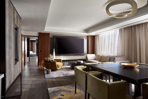 a living room with a couch and a table at Washington Marriott Capitol Hill in Washington