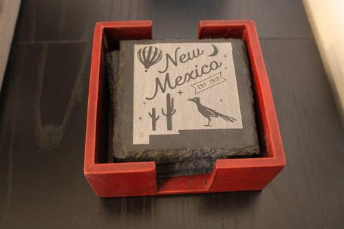 a red box with a new mexico sign in it at Agave Tiny House at Cactus Flower-HOT TUB-Pet Friendly-No Pet Fees! in Albuquerque