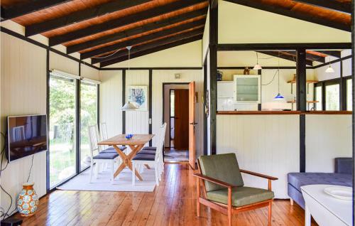 Φωτογραφία από το άλμπουμ του Holiday Home Dronningmolle With Fireplace I σε Dronningmølle