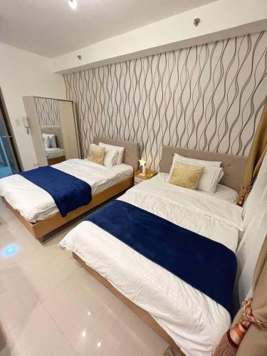 Katil atau katil-katil dalam bilik di M&M Condostay at Shore 2 Residences Tower 2 Pasay City