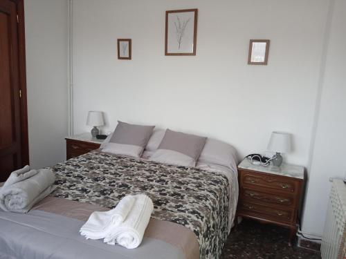 A bed or beds in a room at Bella vista