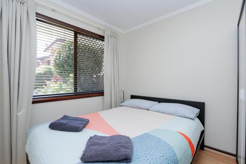 Letto o letti in una camera di Parkline Apartments Perth