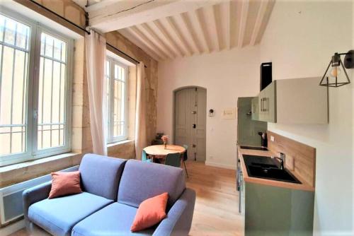 Appartement à deux pas de la place du forum