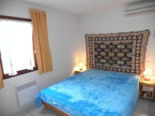 Posteľ alebo postele v izbe v ubytovaní Maison Climatisée 3 Pièces avec Piscine, Terrasse et Proche Mer - Gruissan - FR-1-229-822