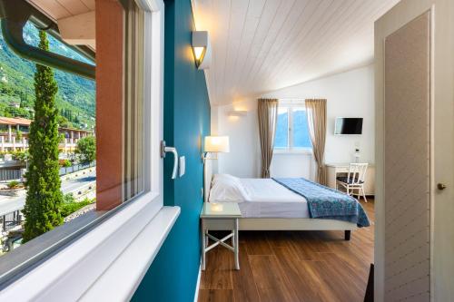 Una cama o camas en una habitación de Hotel Villa Europa