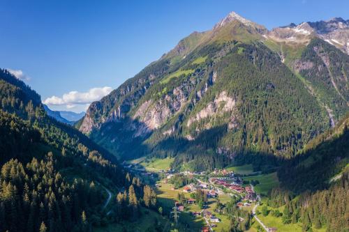 a valley with a town in the middle of a mountain at Apart Emilie in Mayrhofen