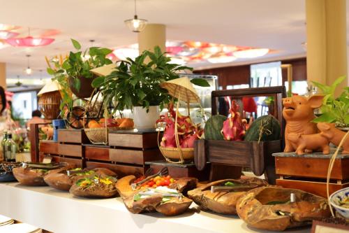 a display of food on a table in a store at Almanity Hoi An Resort & Spa in Hoi An
