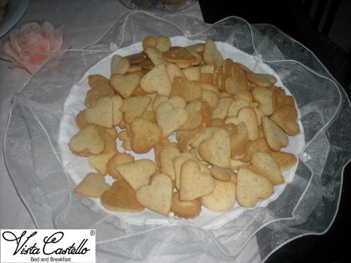 a plate full of cookies on a plastic at Vista Castello in Rovereto