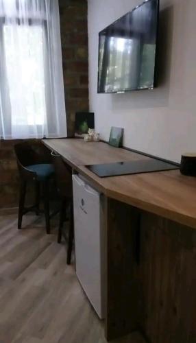 Apartmani Grahovoにあるテレビまたはエンターテインメントセンター