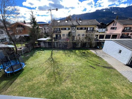 an aerial view of a yard with a house at Ferienhaus Butterfly 2 in Garmisch-Partenkirchen